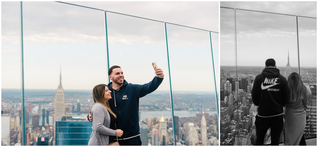 a couple standing in front of the Empire State building at The Edge in Hudson Yards