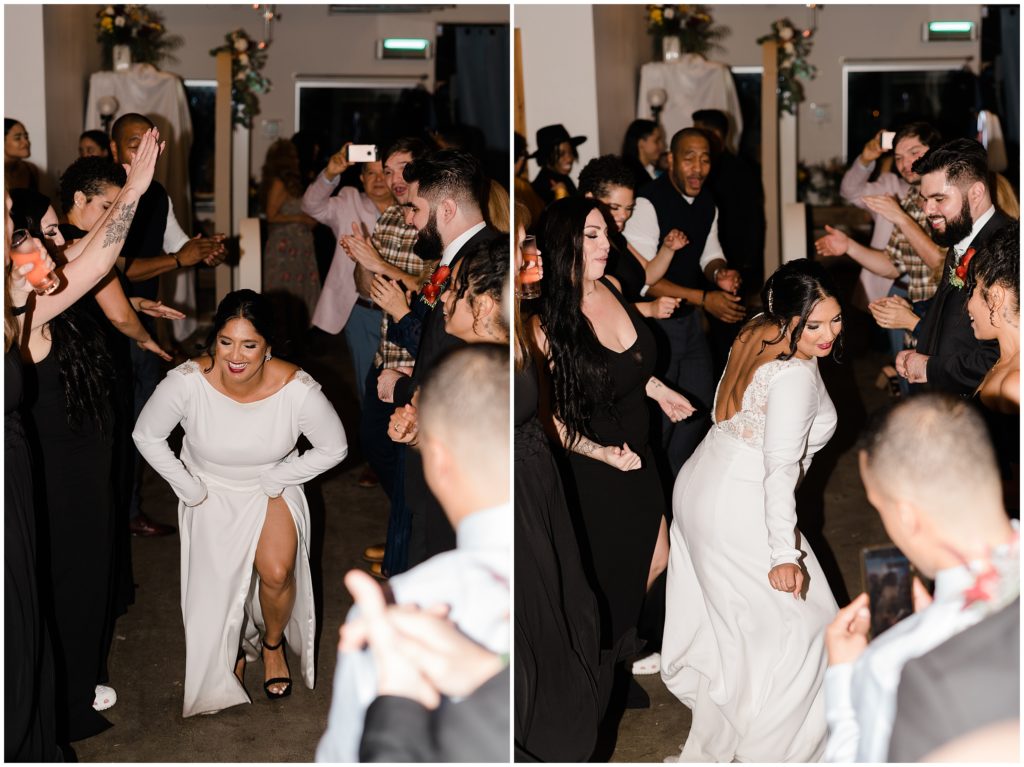 a bride dancing in the middle of the dance floor while people are cheering her on