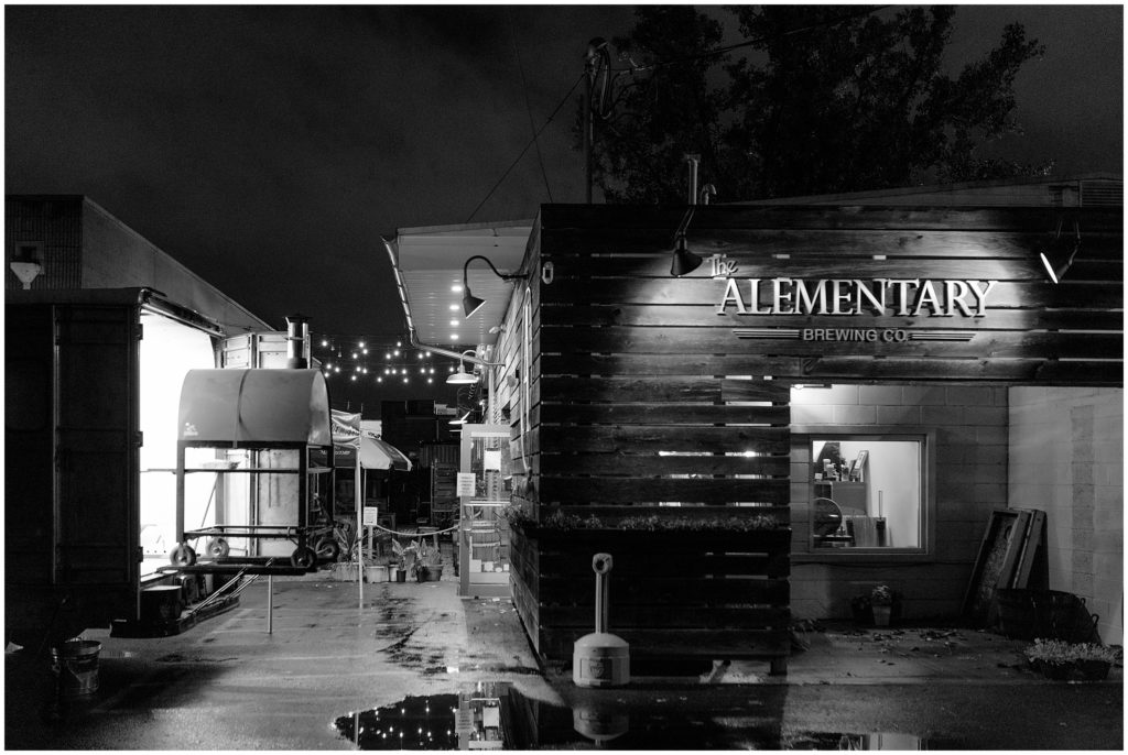 The Alementary brewing building at night. 